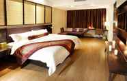 Kamar Tidur 7 Relaxed Season Hotel Longcheng Branch