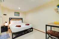 Kamar Tidur Red Pin Inn