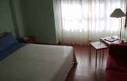 Bedroom 4 Motel Abalo