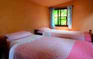 Bedroom 7 Malee's Nature Lovers Bungalows