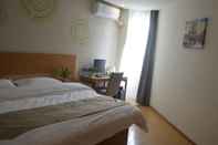 Bedroom GreenTree Inn Anqing Wangjiang County Lantian Road Yiheyuan Express Hotel