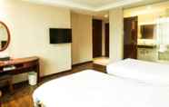 Kamar Tidur 5 GreenTree Inn PuNing International Commodity City Hotel