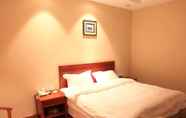 Bedroom 4 GreenTree Aliiance Weifang Zhucheng Heping Street Huayang Hotel