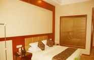 Bedroom 5 GreenTree Alliance JiAn Jizhou District Mixi Hotel