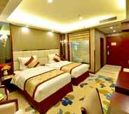 Bedroom 5 GreenTree Eastern ZiGong Huashang International City Huichuan Rd Hotel
