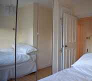 Kamar Tidur 4 Cozy 1 Bedroom Flat near Primrose Hill