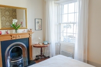 ห้องนอน Sophisticated Edinburgh Apartment in City Centre