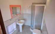 Phòng tắm bên trong 6 Villa Il Fortino