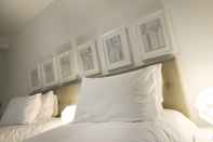 Kamar Tidur Urban Quarters Serviced Apartments