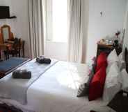 Kamar Tidur 3 Petal's Place Guest House