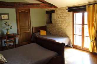 ห้องนอน 4 Chambres d'hôtes Le Puy d'Anché