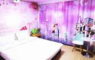 Phòng ngủ 2 Dalian Venus Apartment