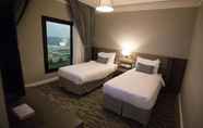 Kamar Tidur 4 Loren Suites Corniche