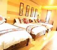 Bedroom 7 Qi Hua Zhen Ju Homestay
