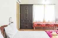 Bedroom GuestHouser 1 BR Homestay 58ba