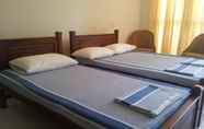 Kamar Tidur 4 Dad's Holiday Home