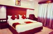 Bedroom 6 Regalia Inn & Suites