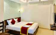Bedroom 5 Regalia Inn & Suites