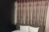 Phòng ngủ Kuk Bin Quan Hotel