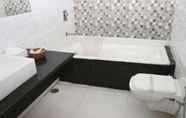 In-room Bathroom 2 Golden Huts Resorts