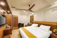 ห้องนอน Hotel Vijay Fablis
