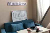 ห้องนอน Dalian Yijia Apartment Sanba Square