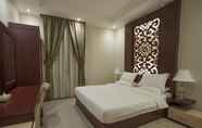 Bedroom 5 Retaj Hotel Apartments
