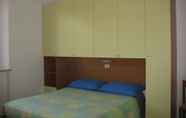 Kamar Tidur 3 Bed & Breakfast Bompadre