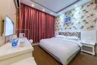 ห้องนอน Zhaoxiangju Hotel Changshui Branch