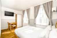 Bilik Tidur Argyle Apart Hotel