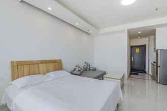 Kamar Tidur 4 WeiHai Emily's Holiday Apartment