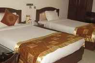 Kamar Tidur Hotel Garv Residencia Gaya