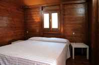 Bedroom Villaggio Camping Calapineta