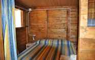 Bedroom 4 Villaggio Camping Calapineta