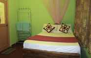 Kamar Tidur 6 Yoho Gimhani Homestay