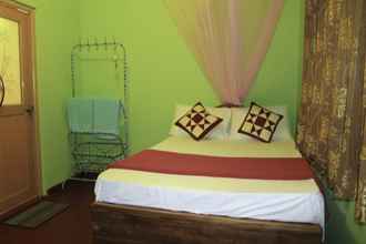 Kamar Tidur 4 Yoho Gimhani Homestay