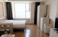 ห้องนอน 2 Dalian Xuanya Apartment