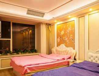 ห้องนอน 2 Guotai Ganghui Huiting Apartment