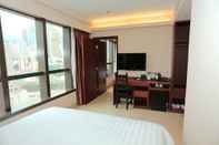 Kamar Tidur WE Hotel