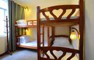 Kamar Tidur 5 Junshe Boutique Guest House - Hostel