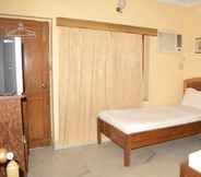Phòng ngủ 2 Hotel Tathagat Inn