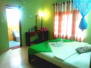 Kamar Tidur 4 Tourist Holiday Home