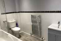 ห้องน้ำภายในห้อง Serviced Apartments East Kilbride