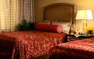 ห้องนอน 7 Jockey Club Suites