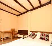 Bedroom 6 Aarya Chaitya Inn