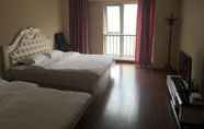 Bedroom 4 Dalian Blazing Sun Seaview Apartment