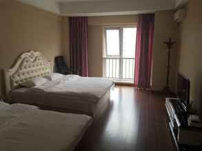 Bedroom 4 Dalian Blazing Sun Seaview Apartment