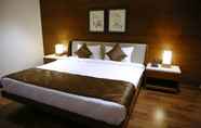 Bilik Tidur 5 Five Petals Hotel & Banquets