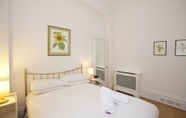 Bedroom 3 A Place Like Home - Two Bedroom Apartment in Knightsbridge