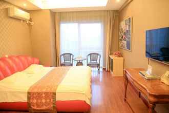 ห้องนอน 4 Dalian Aolai Hotel Apartment